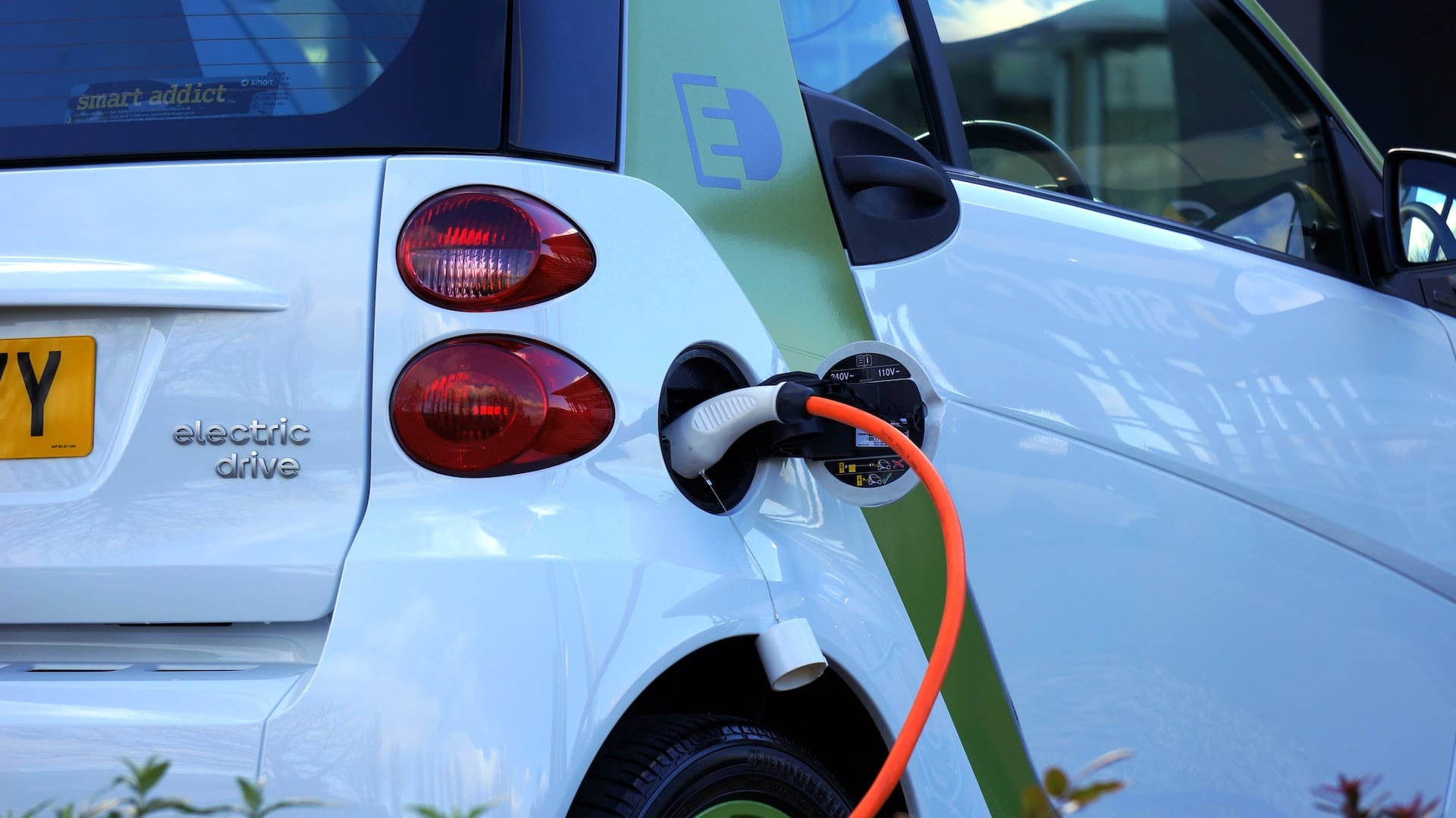 Electric car connected to a charge point