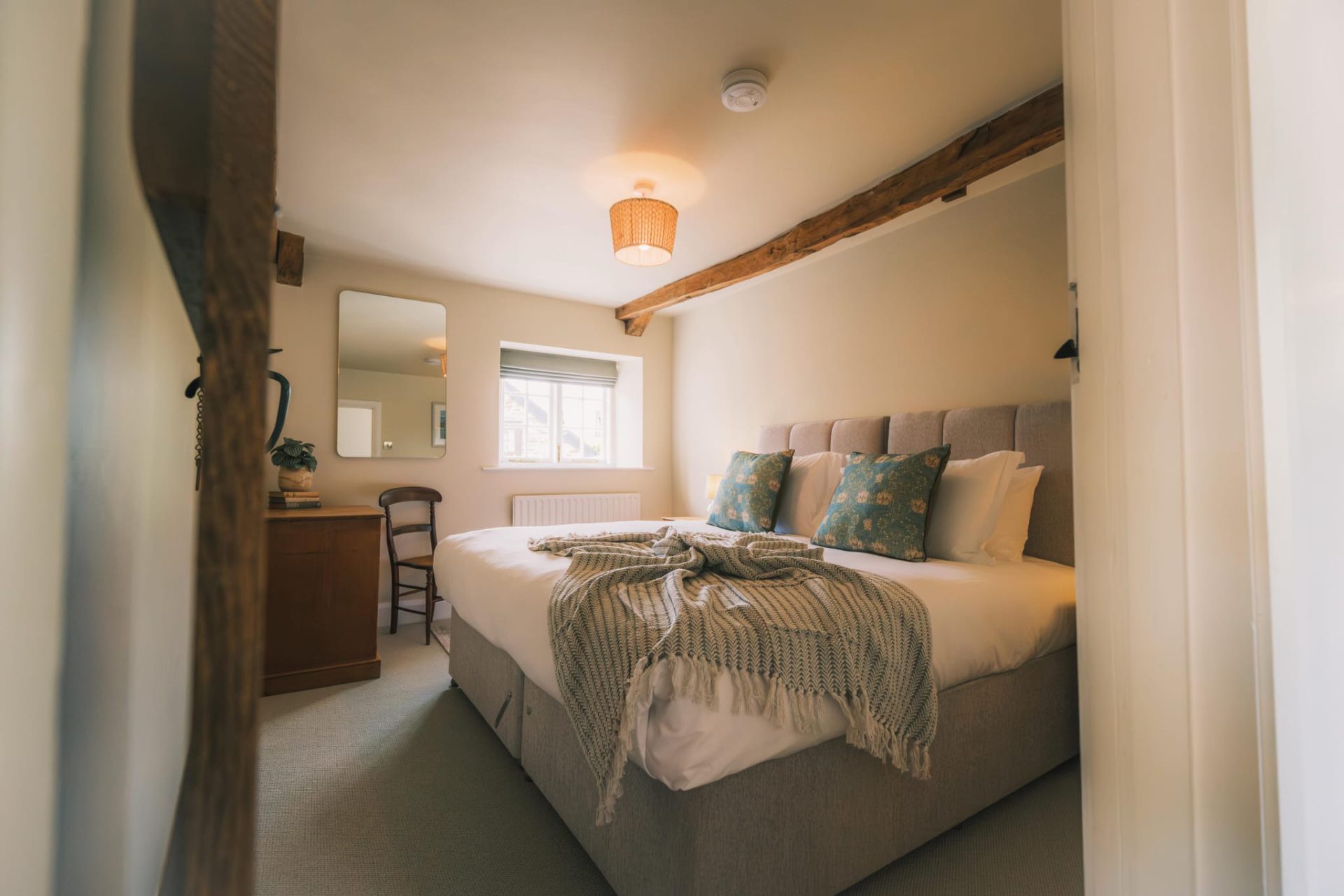 Clean and reset holiday let guest bedroom