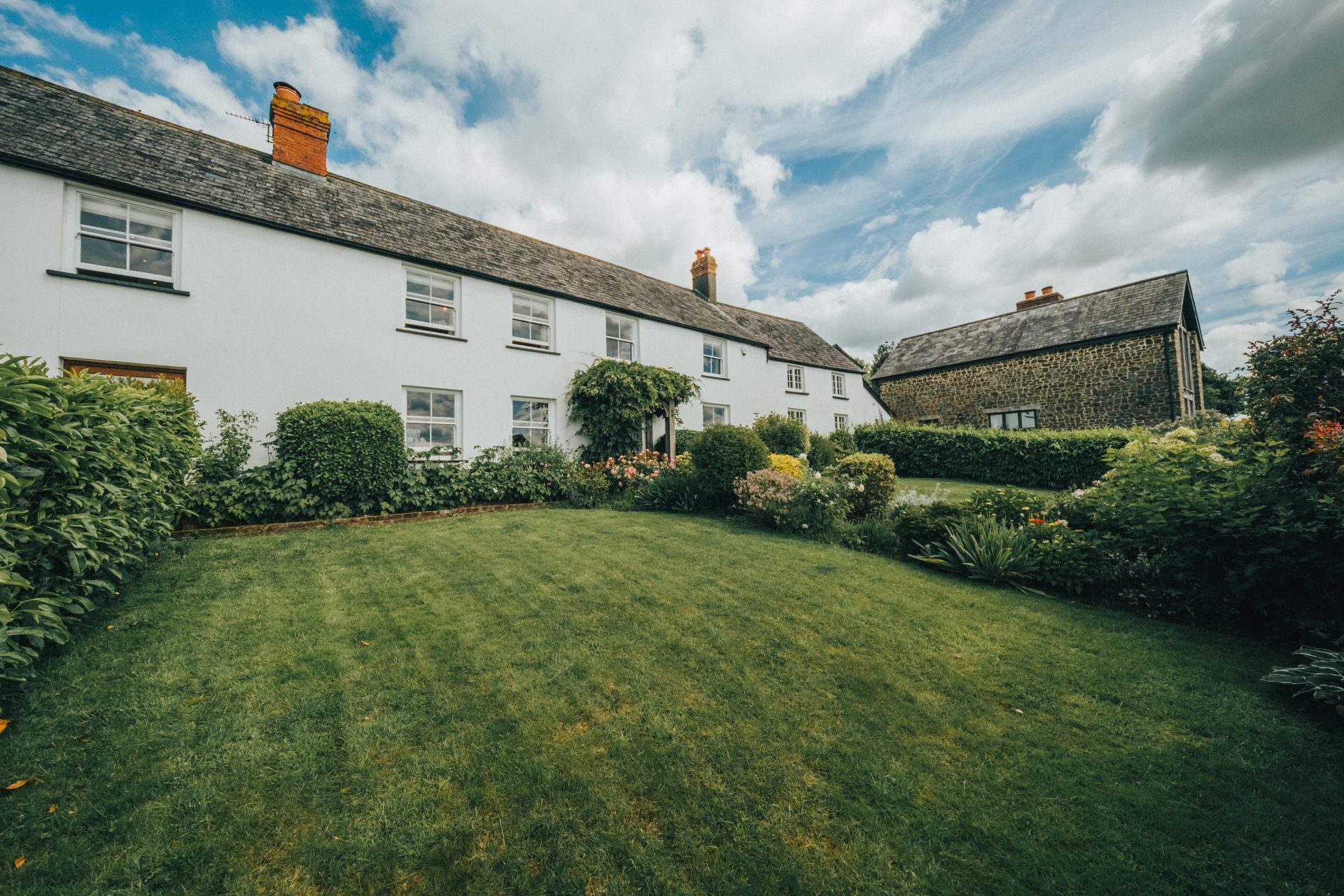 Holiday let exterior and garden at Mornacott Estate